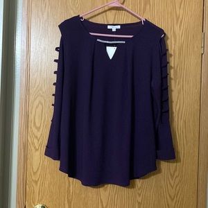 V neck long sleeve with rhinestone trim on the neck